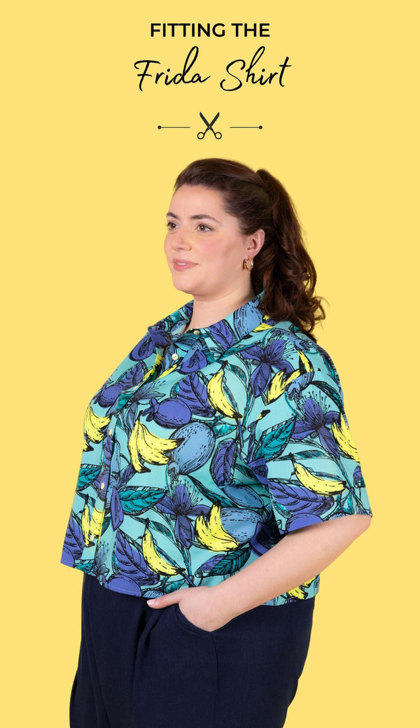 Model wearing the Frida shirt against a yellow background. With the title text 'Fitting the Frida shirt'
